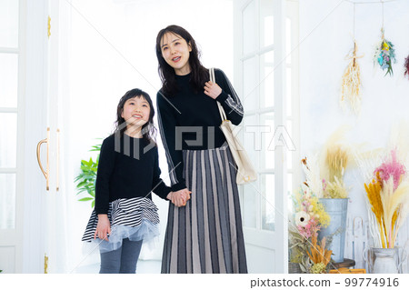 Parent and child going out Parent and child going out 99774916