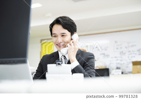 Business office phone male phone call smile Business office phone male phone call smile 99781328