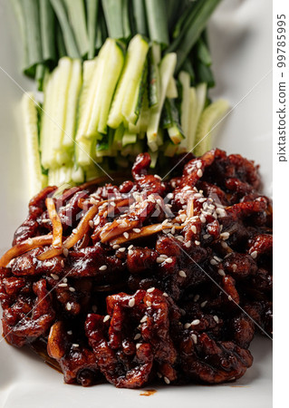 Portion of chinese xinjiang duck with flatbread Portion of chinese xinjiang duck with flatbread 99785995