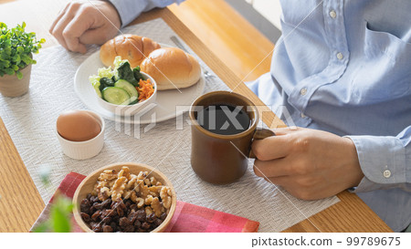 man eating a snack man eating a snack 99789675