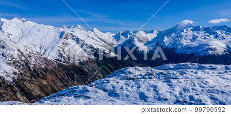 The glaciers in the Swiss Alps - snow covered mountains in Switzerland 99790592