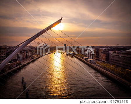 Samuel Beckett Bridge in Dublin at sunset - aerial view Samuel Beckett Bridge in Dublin at sunset - aerial view 99791858