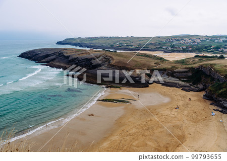 Antuerta Beach. Beach surrounded by cliffs and very popular for surfers 99793655