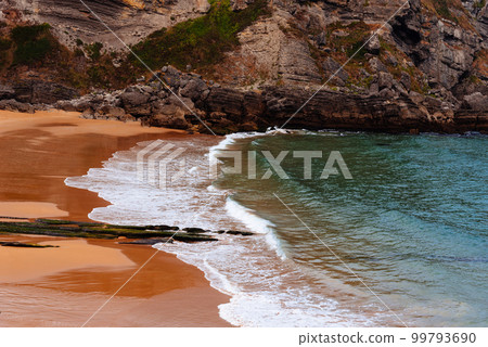 Antuerta Beach. Beach surrounded by cliffs and very popular for surfers 99793690