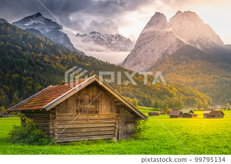 Bavarian alps and rustic farm barn, Garmisch, Zugspitze massif, Bavaria, Germany Bavarian alps and rustic farm barn, Garmisch, Zugspitze massif, Bavaria, Germany 99795134