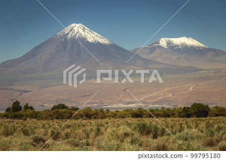 Licancabur and dramatic volcanic landscape at Sunset, Atacama Desert, Chile Licancabur and dramatic volcanic landscape at Sunset, Atacama Desert, Chile 99795180