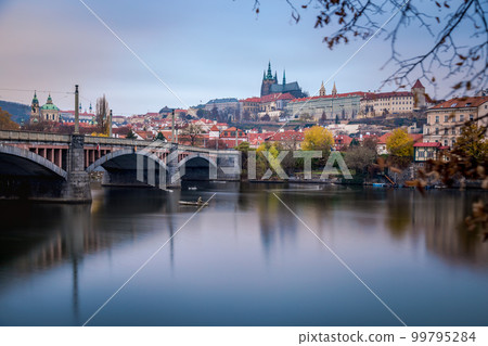 Panoramic view over the cityscape of Prague at dramatic sunset, Czech Republic Panoramic view over the cityscape of Prague at dramatic sunset, Czech Republic 99795284
