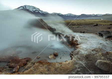 Geysers El Tatio with river and volcanic landscape at sunrise, Atacama, Chile Geysers El Tatio with river and volcanic landscape at sunrise, Atacama, Chile 99795337