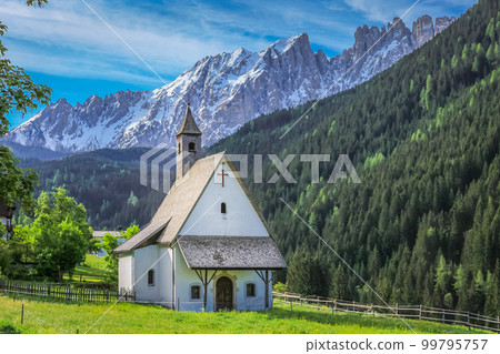 Dolomites italian alpine church chapel near Cortina and Falzarego Pass, Italy Dolomites italian alpine church chapel near Cortina and Falzarego Pass, Italy 99795757