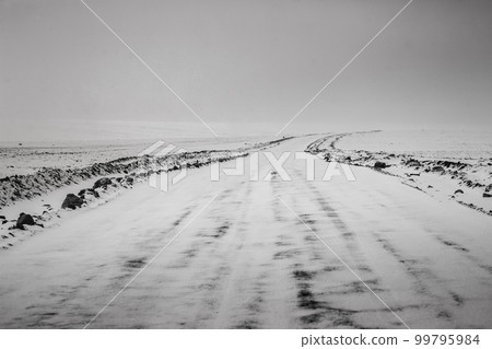 Country mountain Road with snow and hail in the Atacama desert, Chile 99795984