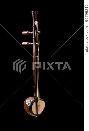 an Asian musical instrument fiddle in black background an Asian musical instrument fiddle in black background 99796212