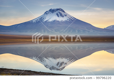 Salt lake Lejia reflection, idyllic volcanic landscape at Sunset, Atacama, Chile Salt lake Lejia reflection, idyllic volcanic landscape at Sunset, Atacama, Chile 99796220