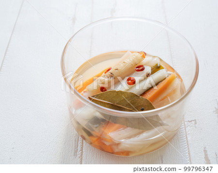 pickles in a glass bowl 99796347