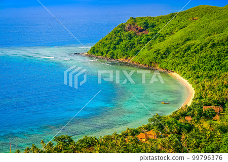 Tropical sandy beach at summer day in Fiji Islands, Pacific ocean 99796376