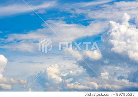clouds and blue sunny sky,  white clouds over blue sky, Aerial view,  nature blue sky white cleat weather. 99796525