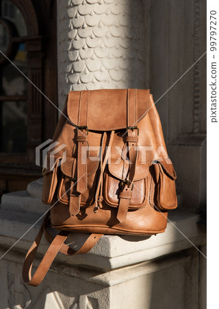 photo of a light brown, retro look leather backpack 99797270