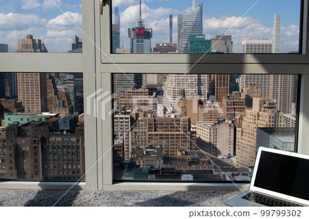 The view from my laptop and my apartment in NY 99799302