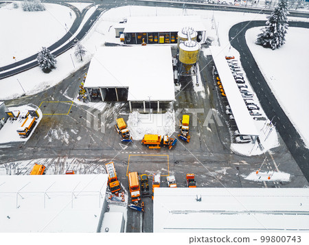 Highway maintenance base on a winter day busy with snow causing problems on the road Highway maintenance base on a winter day busy with snow causing problems on the road 99800743