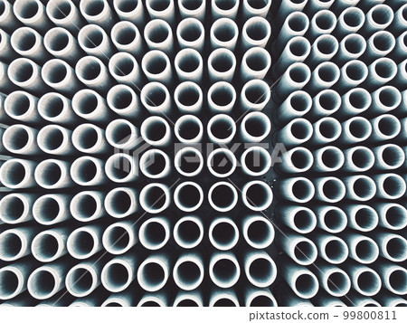 Top down view of round concrete pipes or pillars stacked in rows at the construction firm base Top down view of round concrete pipes or pillars stacked in rows at the construction firm base 99800811