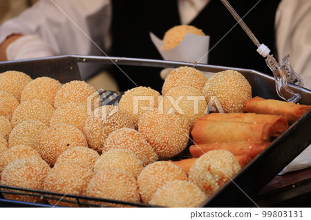 Sesame dumplings sold at stores, a snack in Chinatown Sesame dumplings sold at stores, a snack in Chinatown 99803131