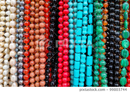 Stack of colorful necklaces for sale Stack of colorful necklaces for sale 99803744