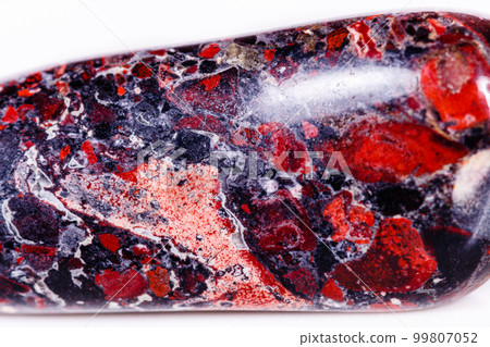 Macro mineral stone Jasper leopard on white background 99807052