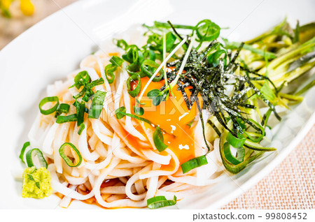 Rice flour bukkake udon with condiments Rice flour bukkake udon with condiments 99808452