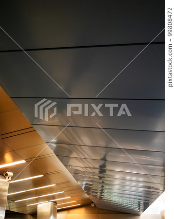 reflections of electric lamps in metal ceiling reflections of electric lamps in metal ceiling 99808472