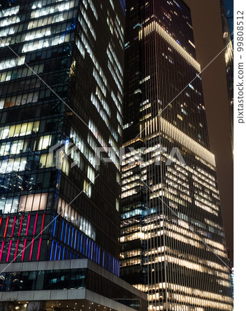 glass towers in Moscow City district in evening 99808512