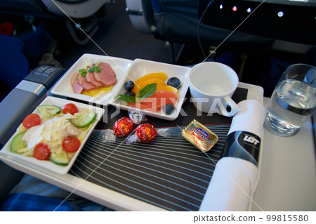 WARSAW, POLAND - 11 MAY 2018: Cold food on a transatlantic flight in Premium Economy Class 99815580