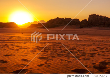 Wadi Rum desert landscape in Jordan at sunset 99815657