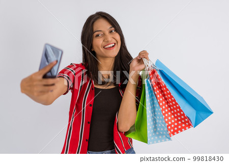 an asian woman smiling while taking selfie photo an asian woman smiling while taking selfie photo 99818430