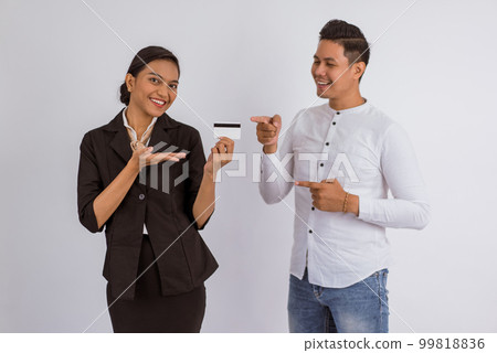 asian man pointing on the blank card that showed by the woman 99818836