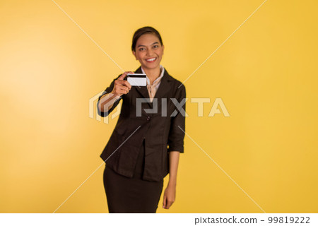 asian woman in formal outfit showing the blank card 99819222