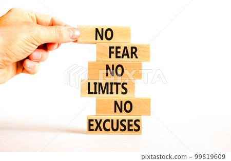 No fear limits excuses symbol. Concept words No fear no limits no excuses on wooden blocks. Beautiful white background. Businessman hand. Business not fear limits excuses concept. Copy space. 99819609