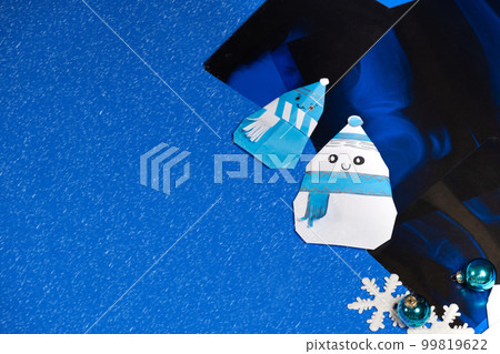 Christmas radiology - X-rays, snowmen and snowflakes on a blue background, a place for text 99819622