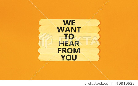 Support symbol. Concept words We want to hear from you on wooden stick. Beautiful orange table orange background. Business support we want to hear from you concept. Copy space. 99819623