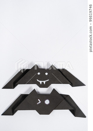 Halloween bats, origami DIY paper crafts on white background, top view Halloween bats, origami DIY paper crafts on white background, top view 99819746