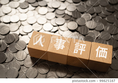 Blocks and coins written as personnel evaluation 99825187