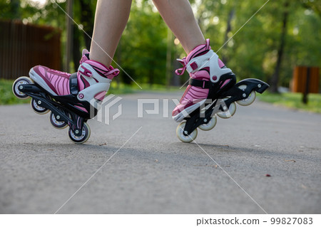 Learning to do tricks on roller skates. Learning to do tricks on roller skates. 99827083