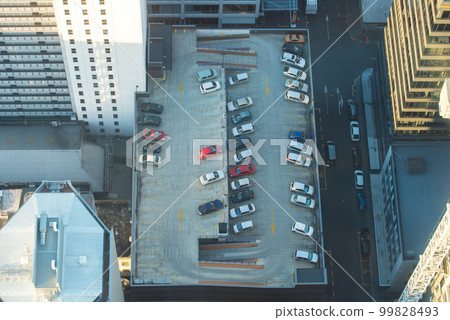 Aerial view of car park on the building in the downtown of Auckland, New Zealand. Aerial view of car park on the building in the downtown of Auckland, New Zealand. 99828493