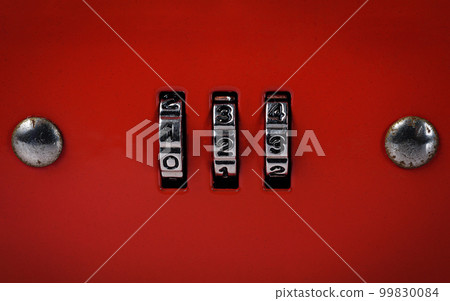 close up of a padlock with code close up of a padlock with code 99830084