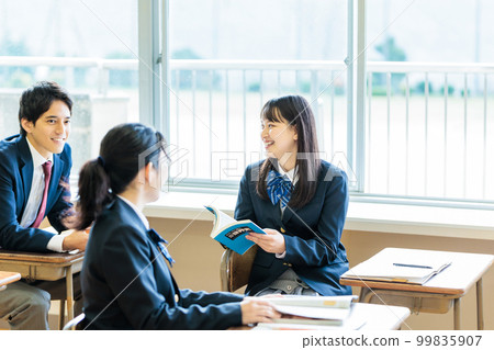 High school student talking happily with classmates in the classroom 99835907