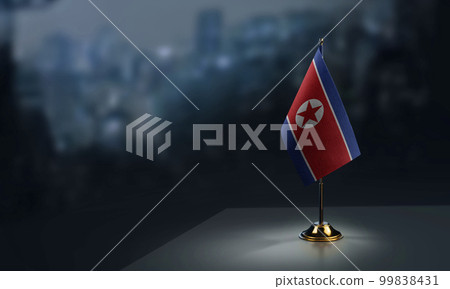 Small flags of the North Korea on an abstract blurry background Small flags of the North Korea on an abstract blurry background 99838431