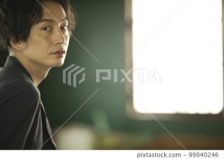 portrait of a man with a serious expression portrait of a man with a serious expression 99840246
