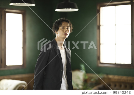 portrait of a man with a serious expression portrait of a man with a serious expression 99840248