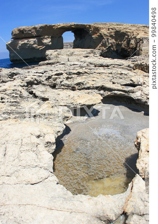 eroded landscape of Gozo Island, Malta eroded landscape of Gozo Island, Malta 99840498