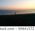 Sunset beach and child silhouette 99841572