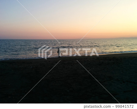 Sunset beach and child silhouette 99841572