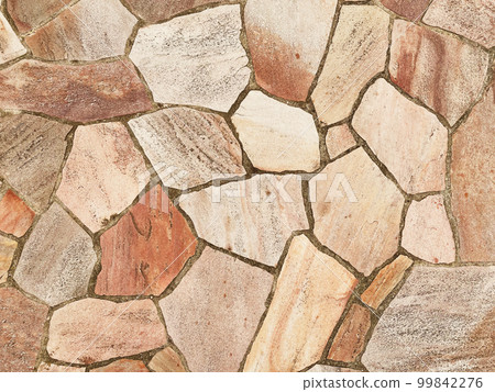 A background image of a surface of paving stones of light light brown color 99842276